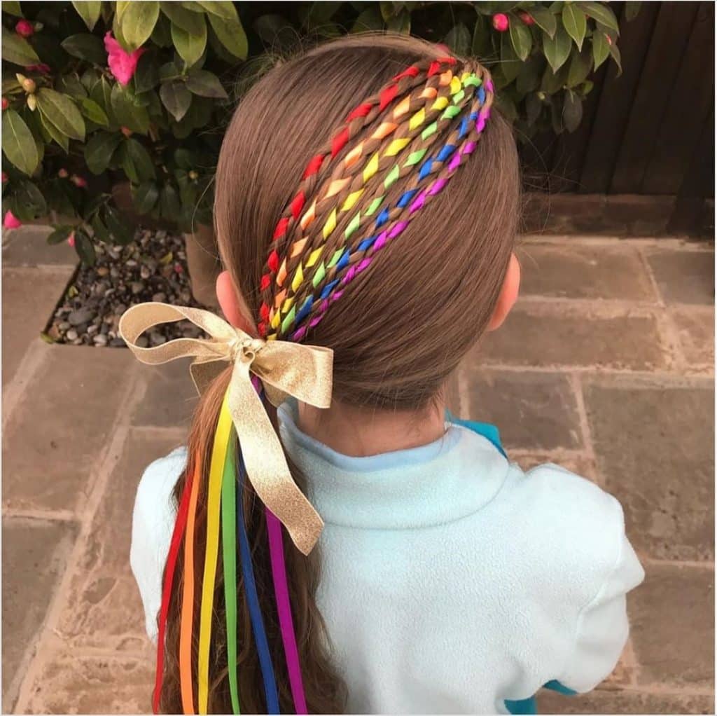 Rainbow braids are a great idea for hairdos to show your Irish pride this St Patrick's Day.