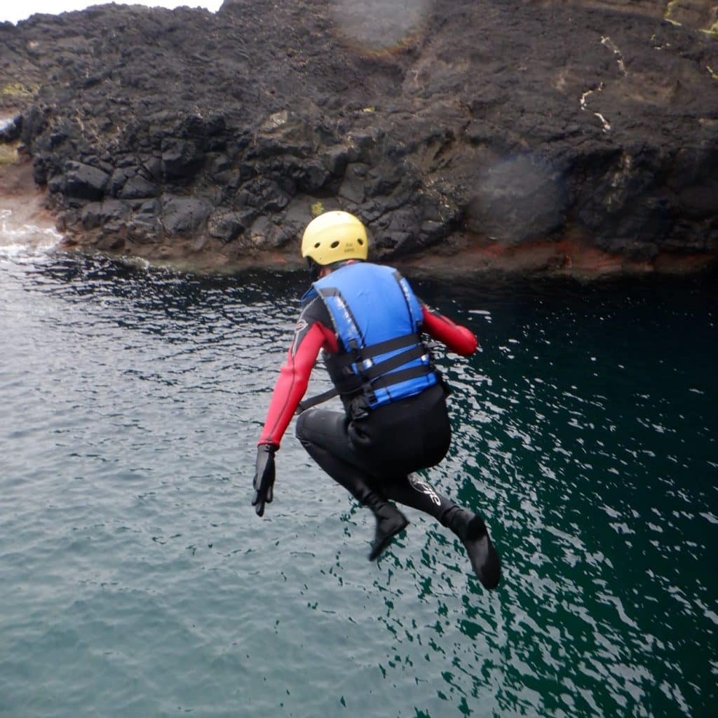 Go coasteering.