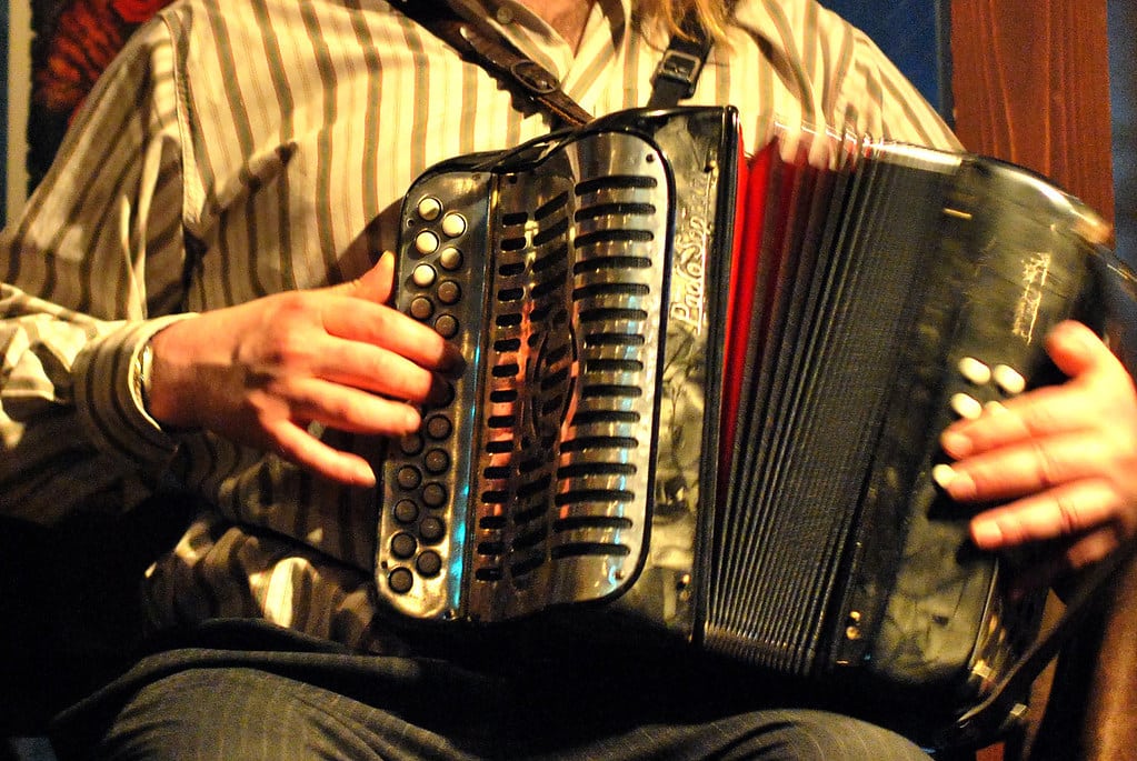 The accordion is a bellows operated reed instrument.