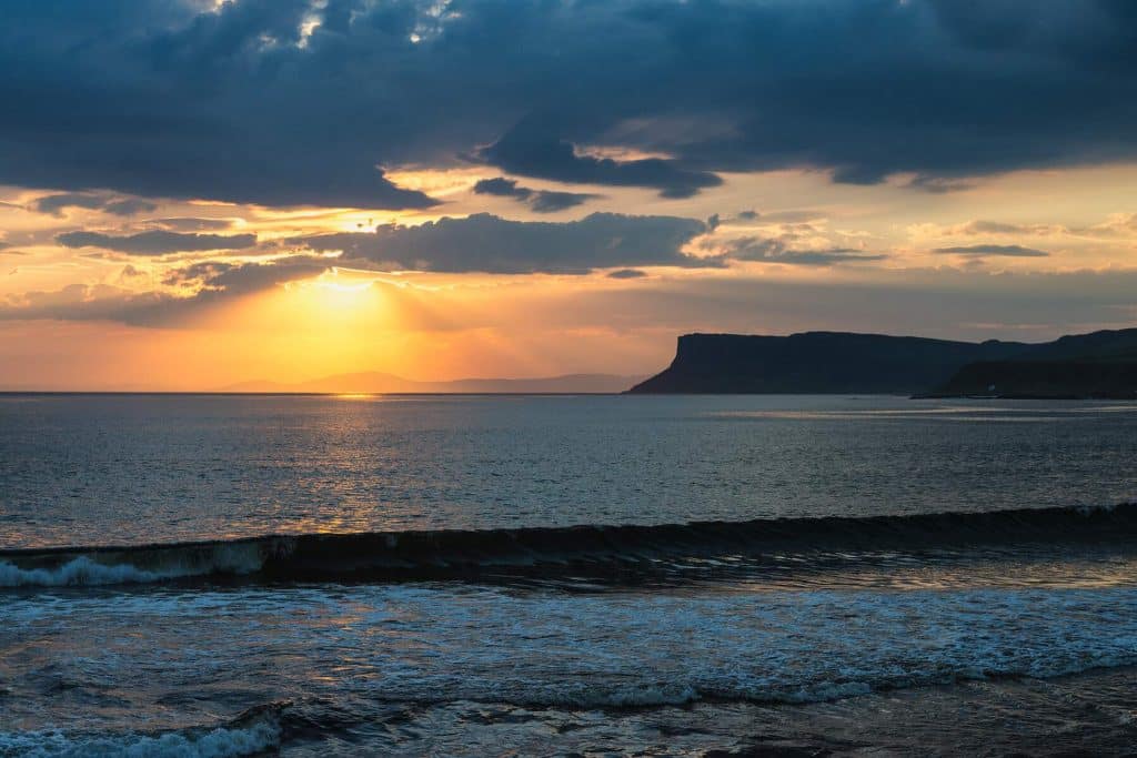 End day six of your one week Ireland itinerary with a magical sunset in Ballycastle.