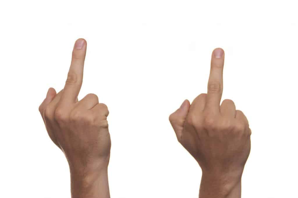 Double middle fingers kick off our list of the most rude Irish hand gestures.