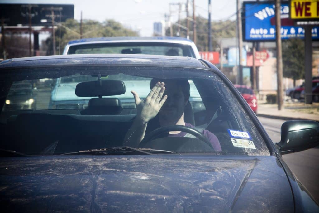 Throwing your hands up is another type of Irish driver hand signal. 