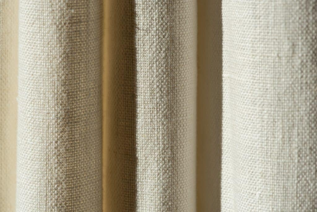 Curtains are drawn in the home of the deceased.