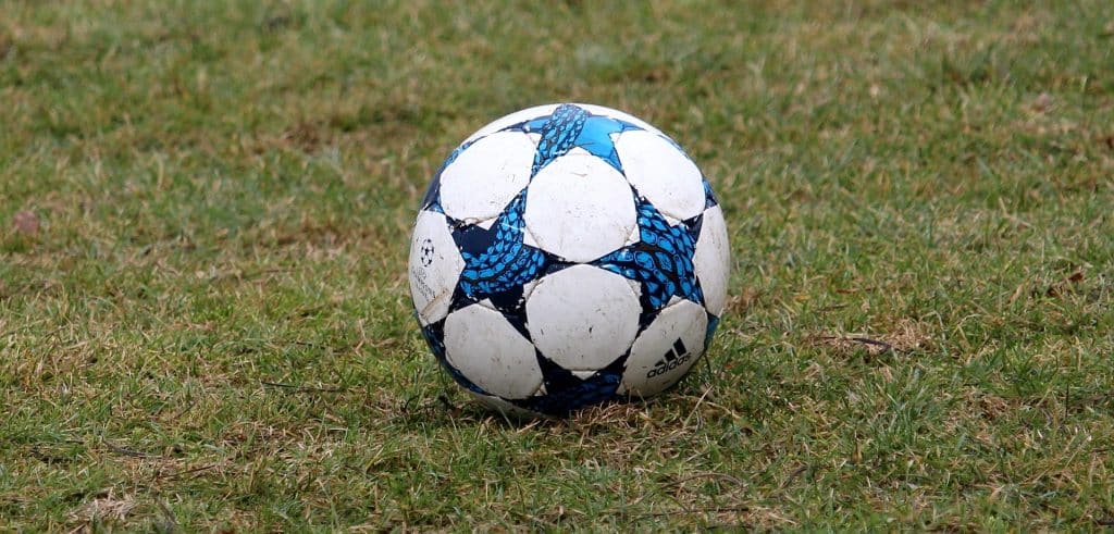 Champion's League football on a pitch.