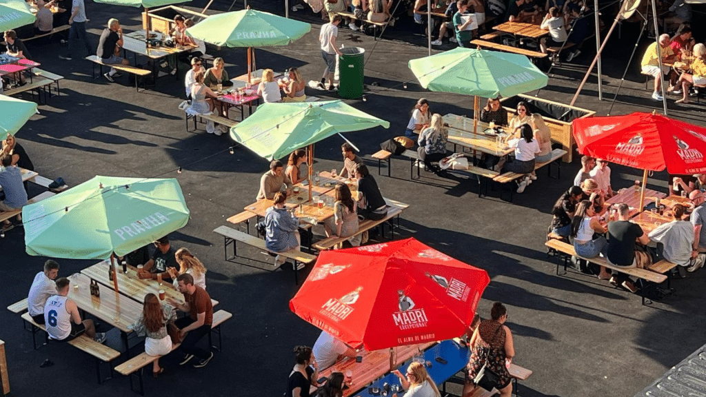 Revellers enjoying the sunshine at Trademarket.