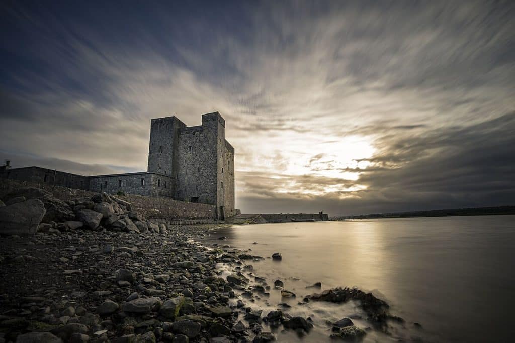 A shot of Oranmore Castle on an overcast day with the sun breaking through the clouds at one point.