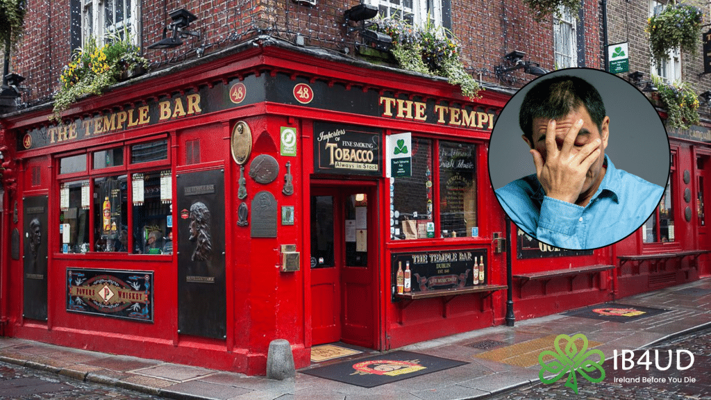 The iconic red exterior of The Temple Bar pub in Dublin is shown with a circular cutout of a frustrated man holding his face.