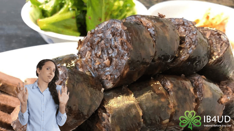 Sliced traditional blood pudding with a woman raising her hands in hesitation next to it.