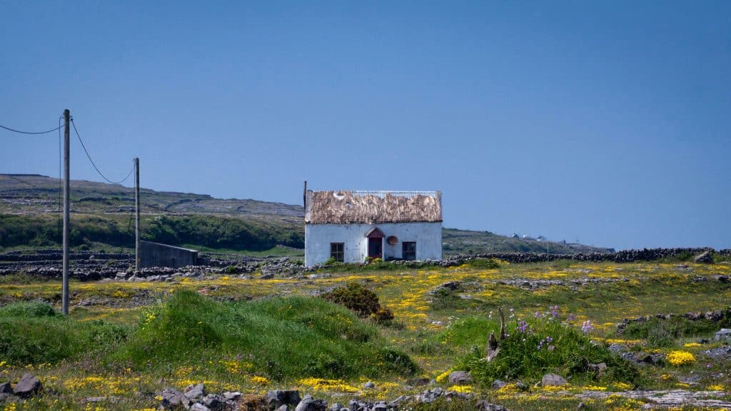 Picture of a smal isolated cottage on  Aran Islands.